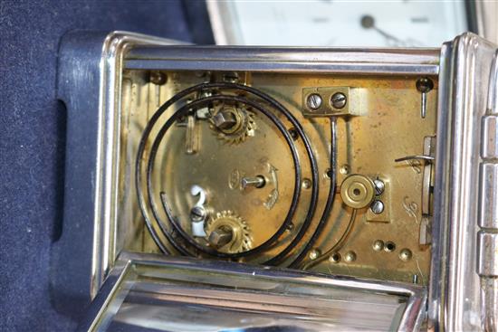 A French silvered brass carriage clock and a similar timepiece